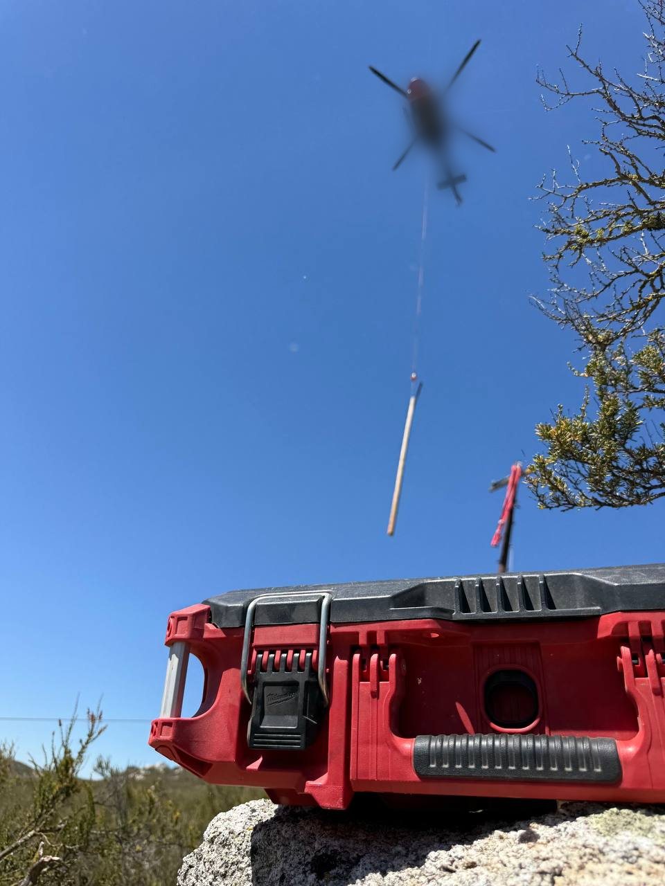 WebStar Box closed on a rock with a helicopter overhead